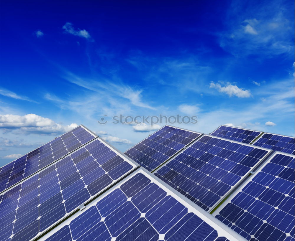 Similar – Photovoltaic panels in a solar power plant over a blue sky.