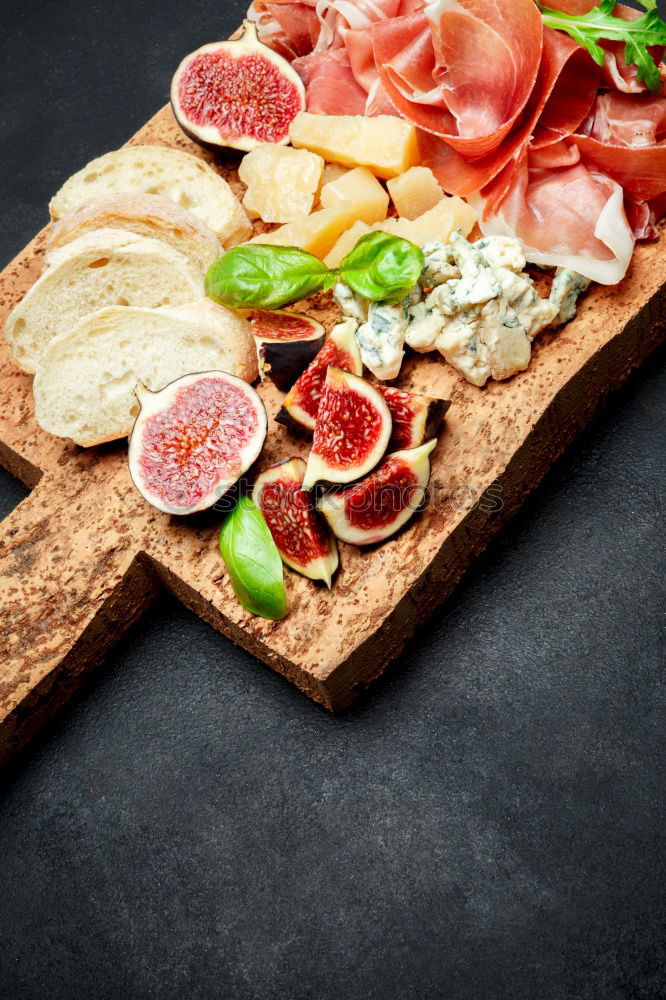 Similar – Raw farfalle pasta, basil and vegetables