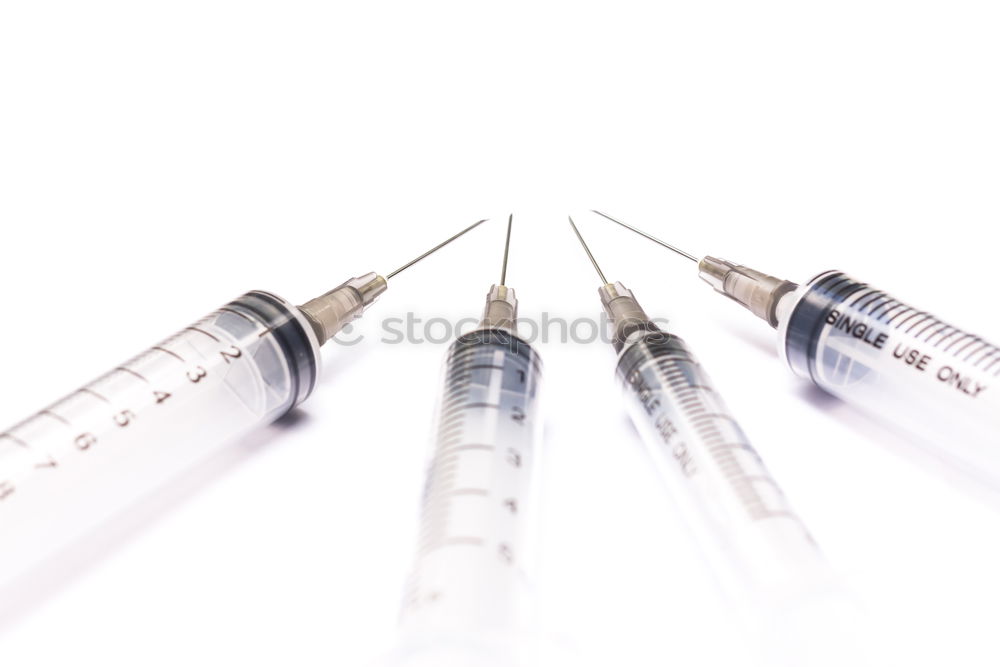 Similar – Medical syringe isolated over white background, injection]