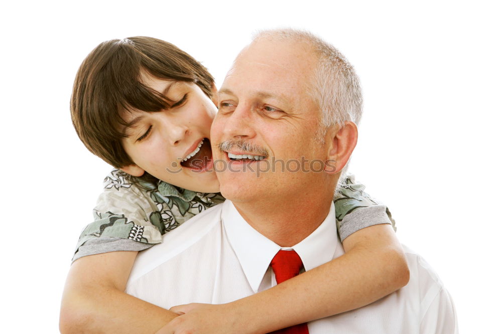 Portrait of happy father and daughter embracing on the street