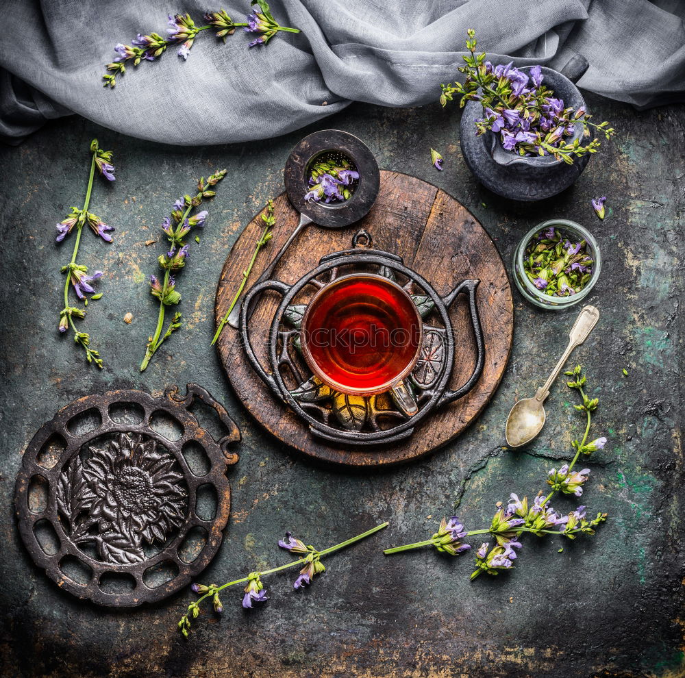 Similar – Cup of herbal tea on a dark background