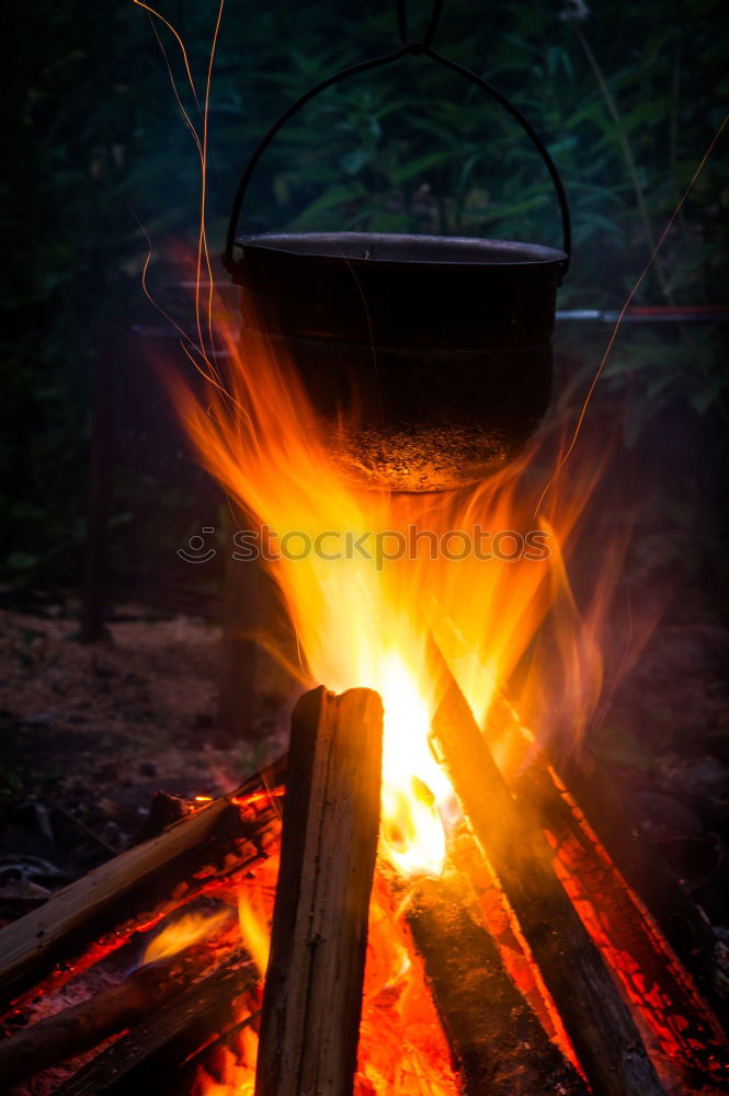 Similar – Making coffee on campfire