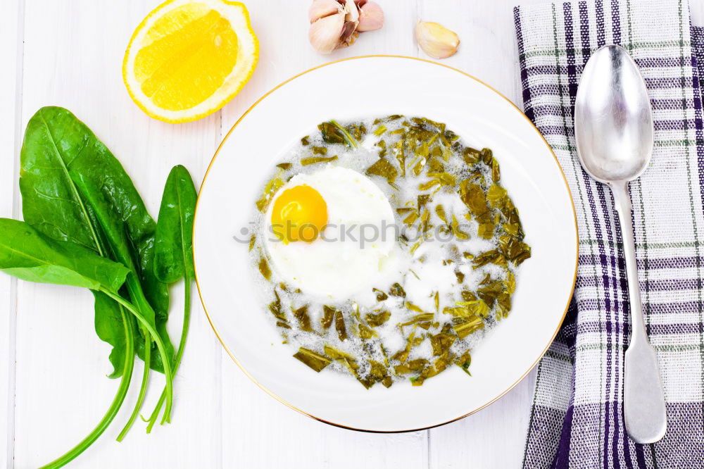 Similar – Image, Stock Photo Fresh spinach with cooking ingredients in an old sieve