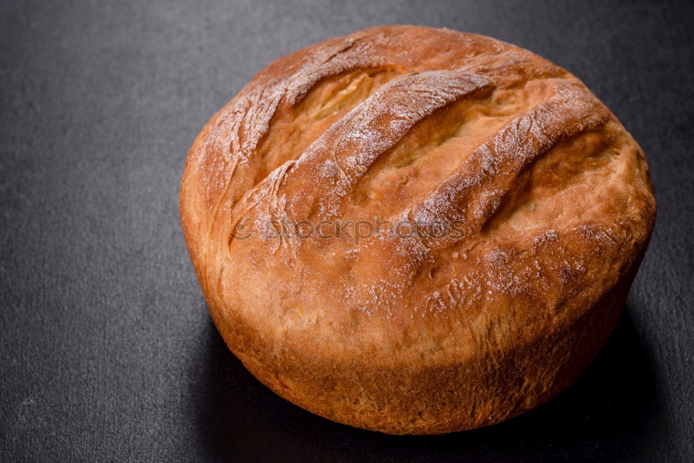 Similar – whole baked round bread