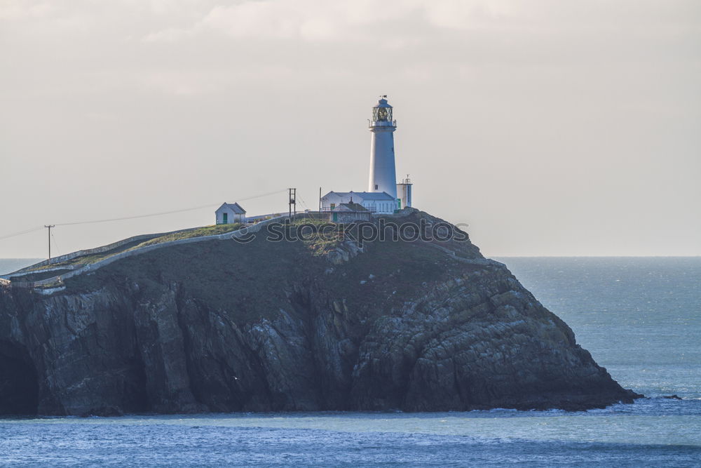 Similar – Image, Stock Photo lighthouse Rock Coast