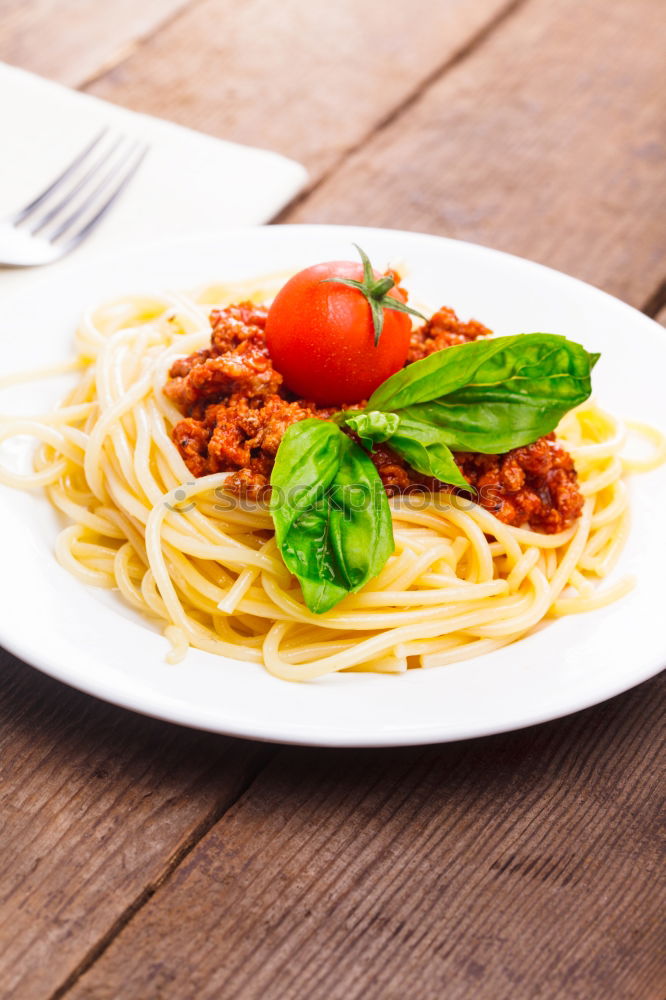 Similar – Spaghetti Bolognese in plate with fork