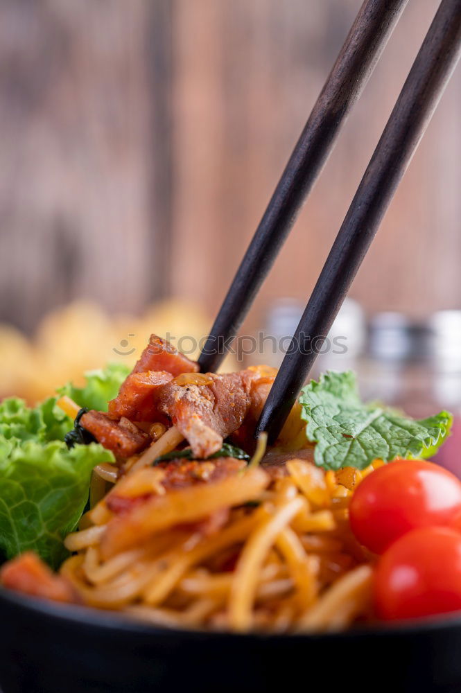 Similar – Image, Stock Photo Asian noodle pan with chicken and vegetables