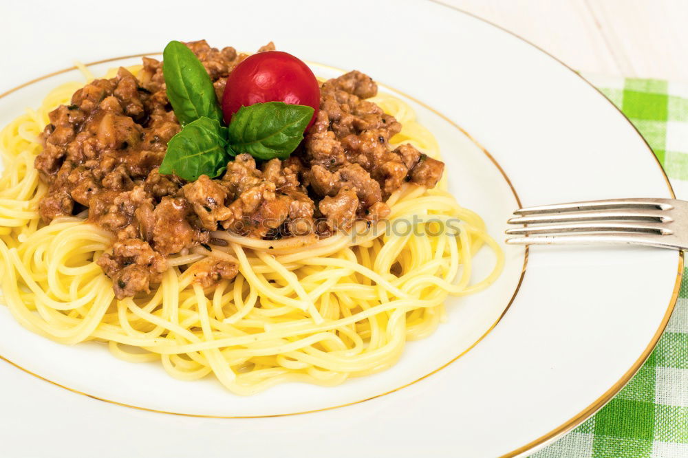 Similar – Spaghetti Bolognese in plate with fork