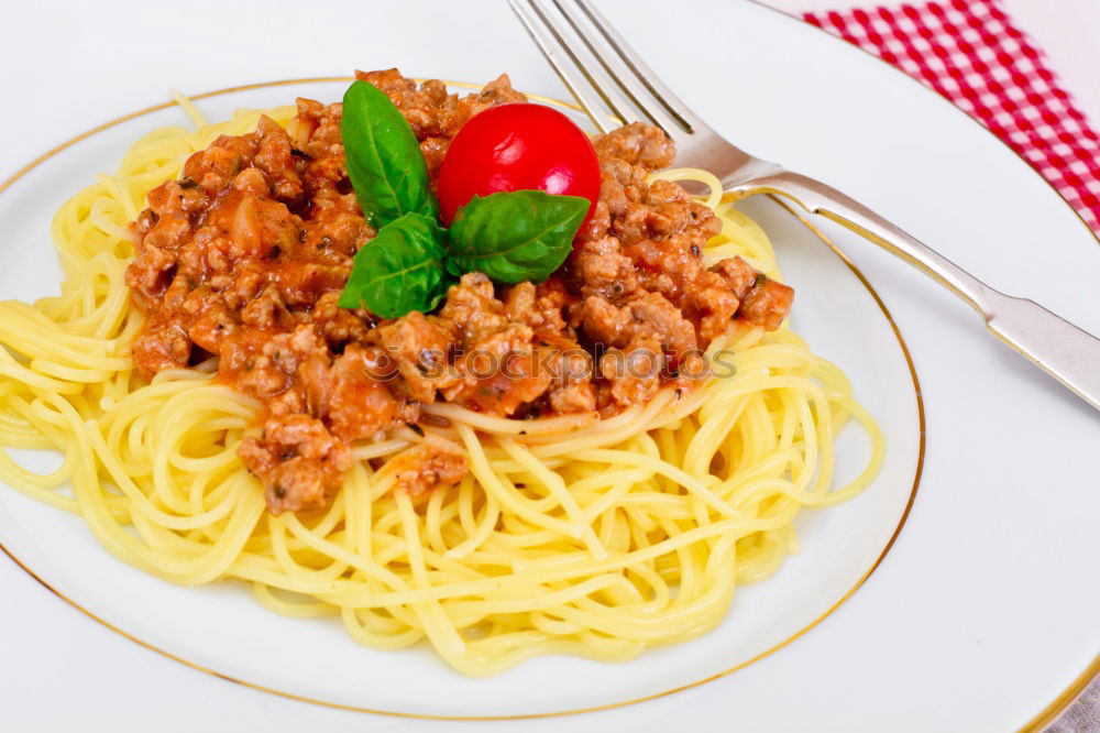 Similar – Spaghetti Bolognese in plate with fork