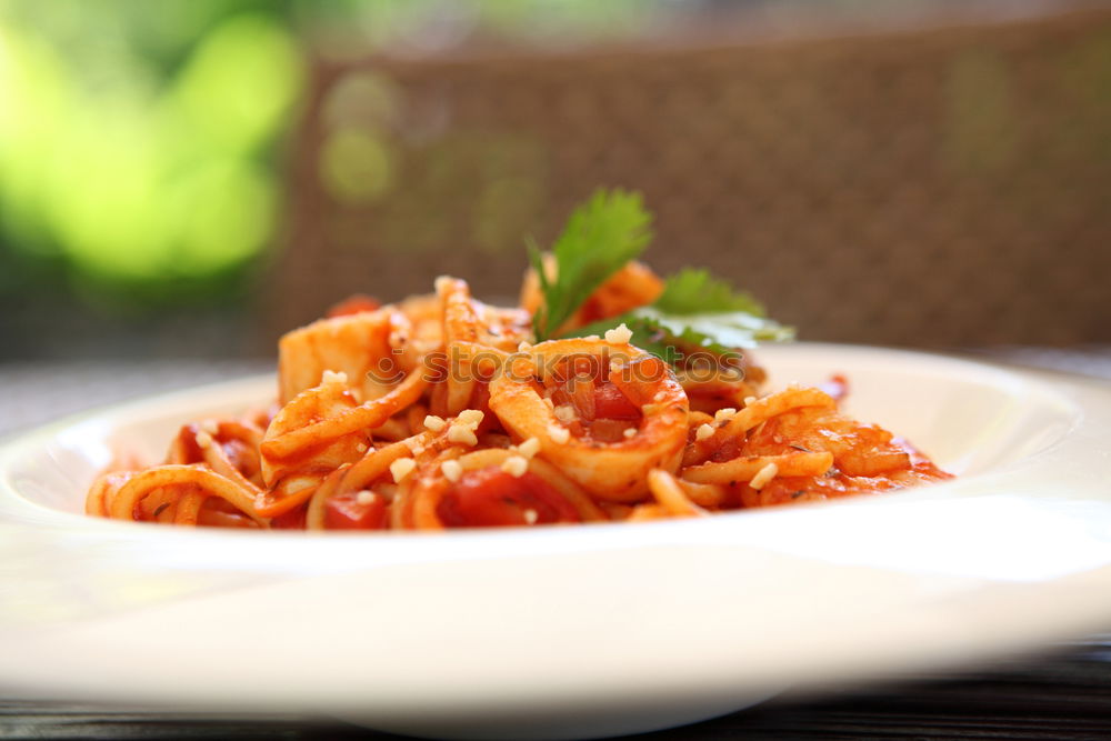 Similar – Plate of penne pasta with arrabiata sauce