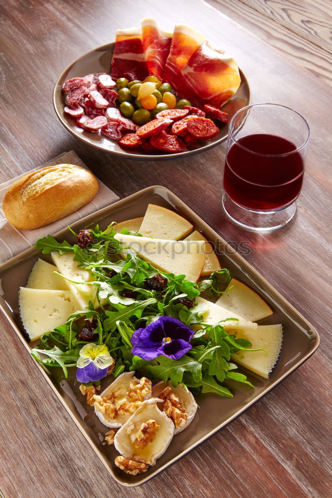 Similar – Homemade breakfast: bread with cheese, ham and lettuce, with app