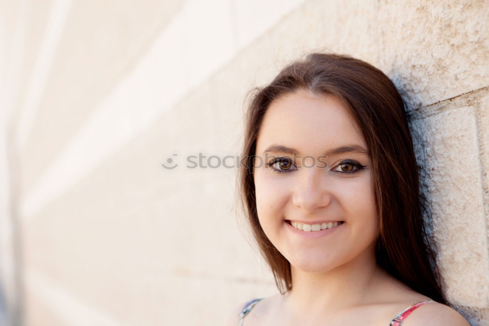 Similar – Image, Stock Photo Attractive stylish woman relaxing against a wall