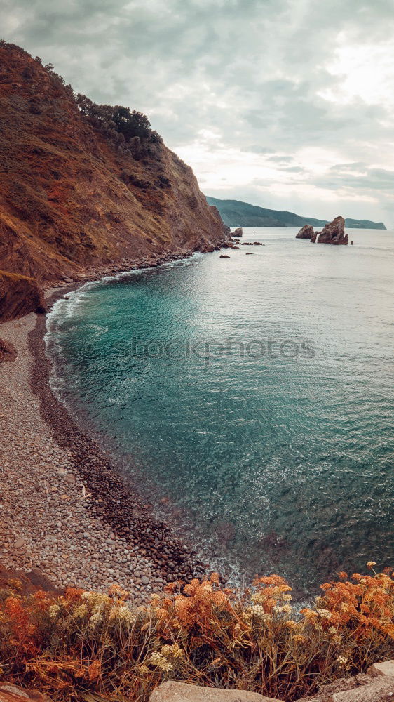 Cliff in ocean with walkway