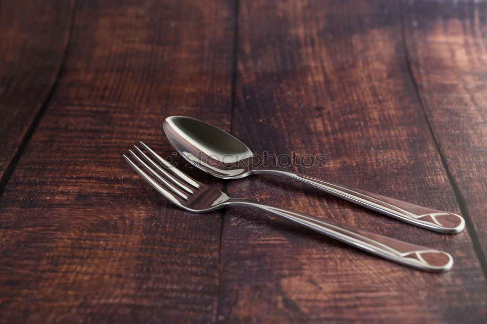 Similar – Empty grill pan with wooden spatula and spoon