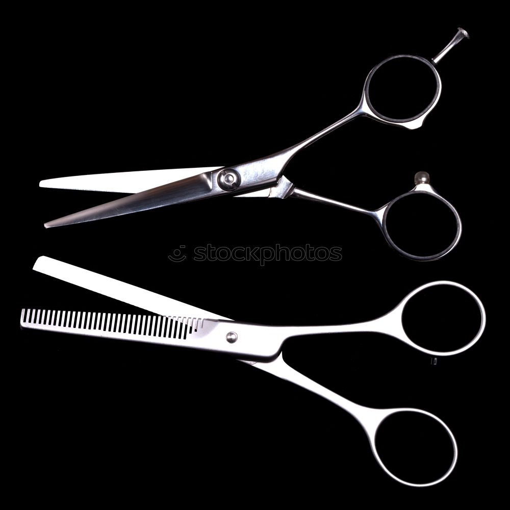 Similar – Set of professional barber scissors