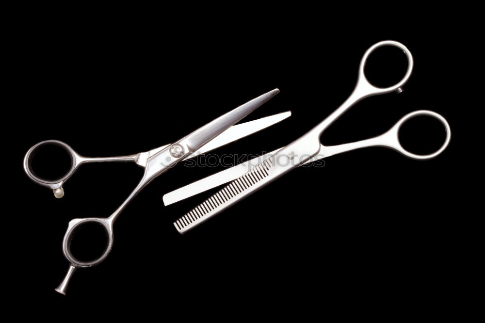 Similar – Set of professional barber scissors