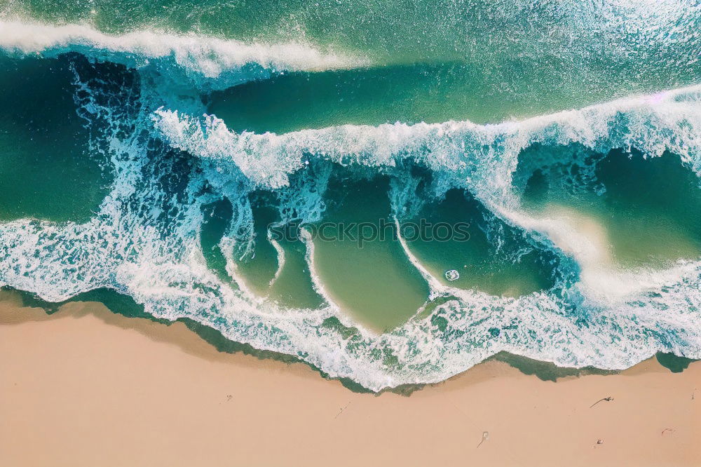 Similar – Turquoise blue sea and waves at the sand beach