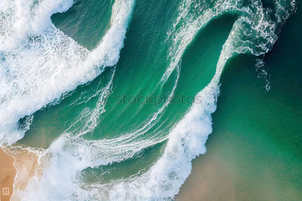 Similar – Rockpool surrounded by the ocean on a sunny day