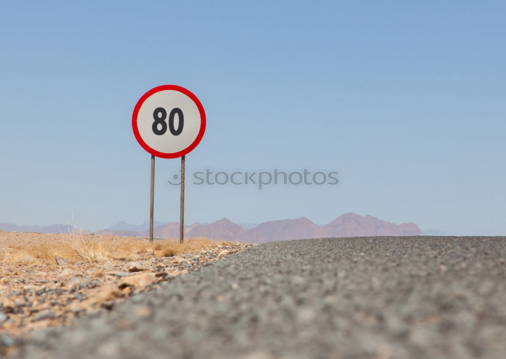 Similar – Image, Stock Photo Paraglider pilots hover in, on the steep coast at Rainbow Beach. Top speed sign for cars 40 km stands at the beach .Queensland / Australia