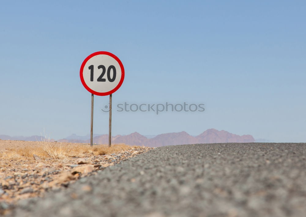 Similar – Image, Stock Photo Paraglider pilots hover in, on the steep coast at Rainbow Beach. Top speed sign for cars 40 km stands at the beach .Queensland / Australia