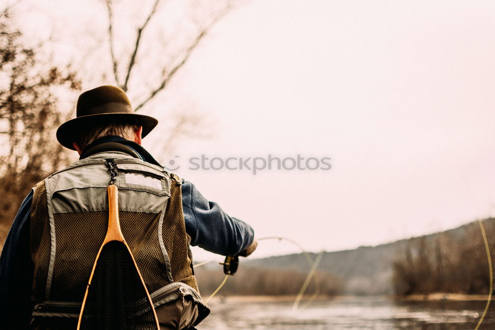 Similar – Tourist man at lake Man