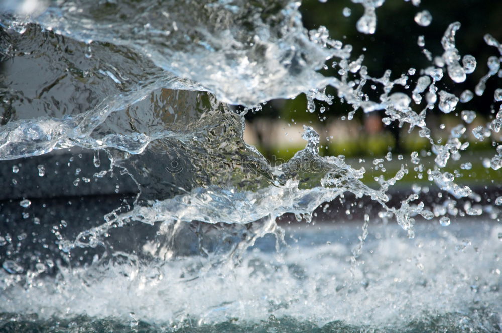 Similar – Wasserspiel Wassertropfen