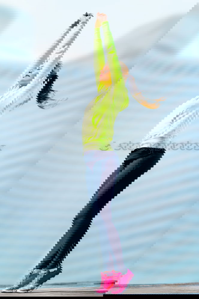 Similar – Image, Stock Photo athletic woman doing her stretching routine