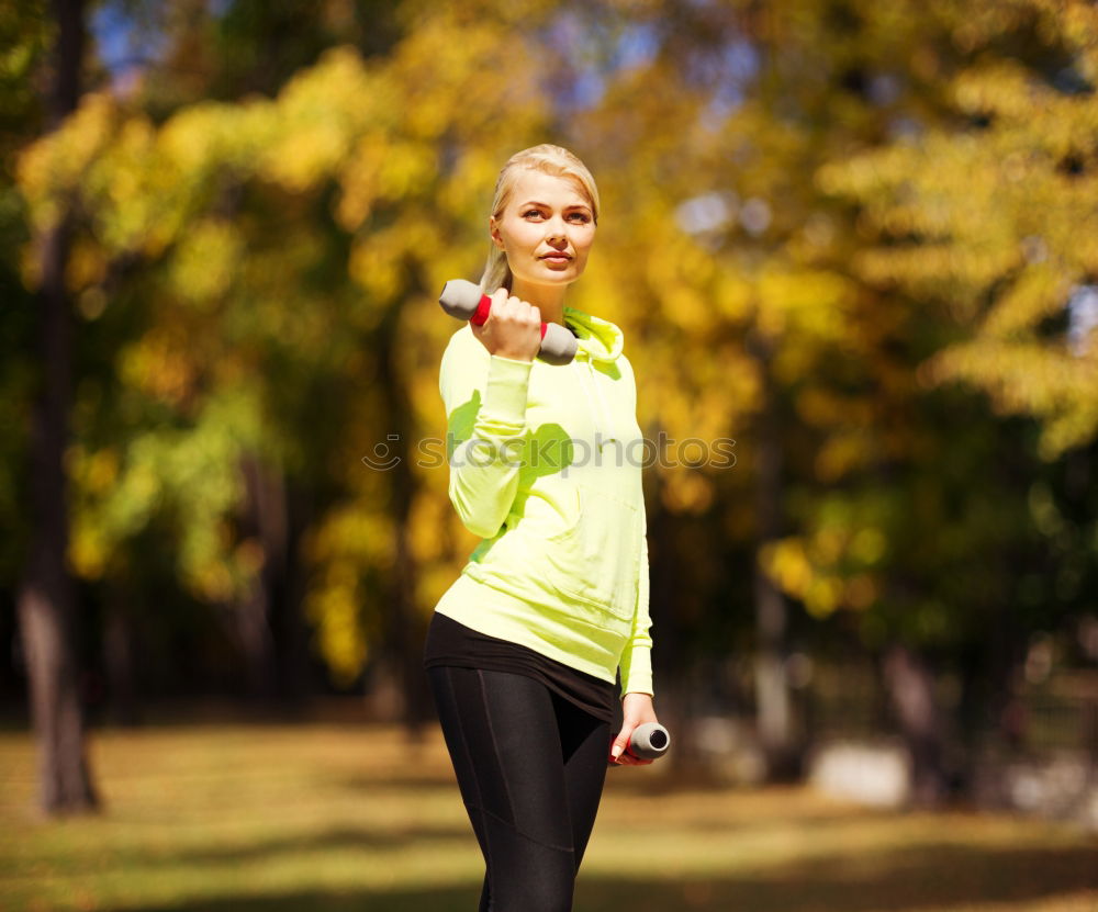 Similar – Healthy Woman Jogging in the Park with her Dog