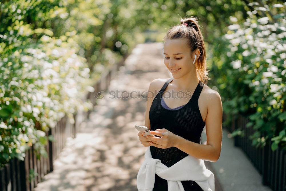 Similar – Image, Stock Photo close up portrait of a woman doing sport resting outdoor smiling and listening music