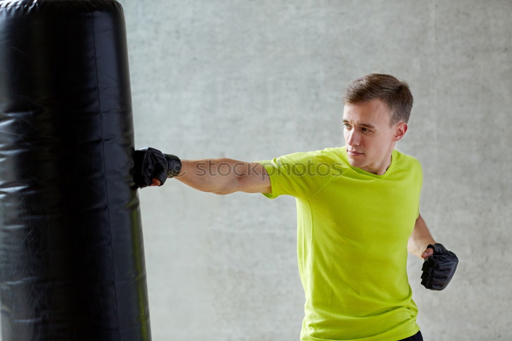 Similar – Image, Stock Photo Young thai boxing man is doing a workout for fight