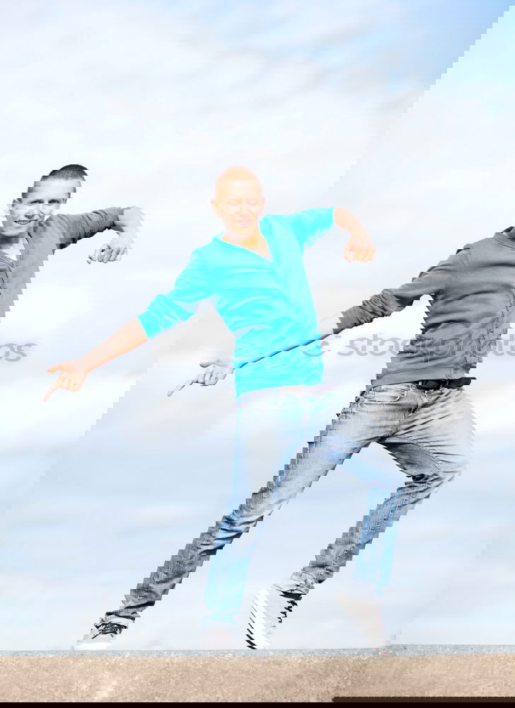 Similar – Image, Stock Photo Young black man wearing casual clothes jumping in urban background.