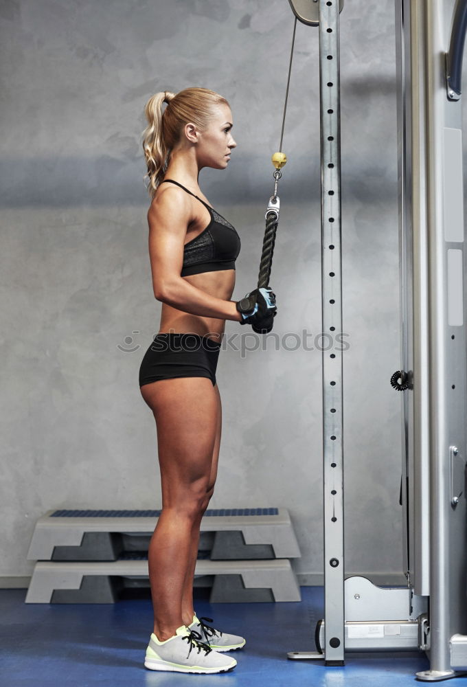 Similar – Woman standing out with a fitness straps