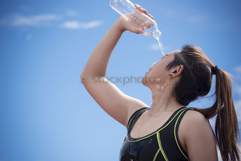 Similar – athletic woman resting and drinking