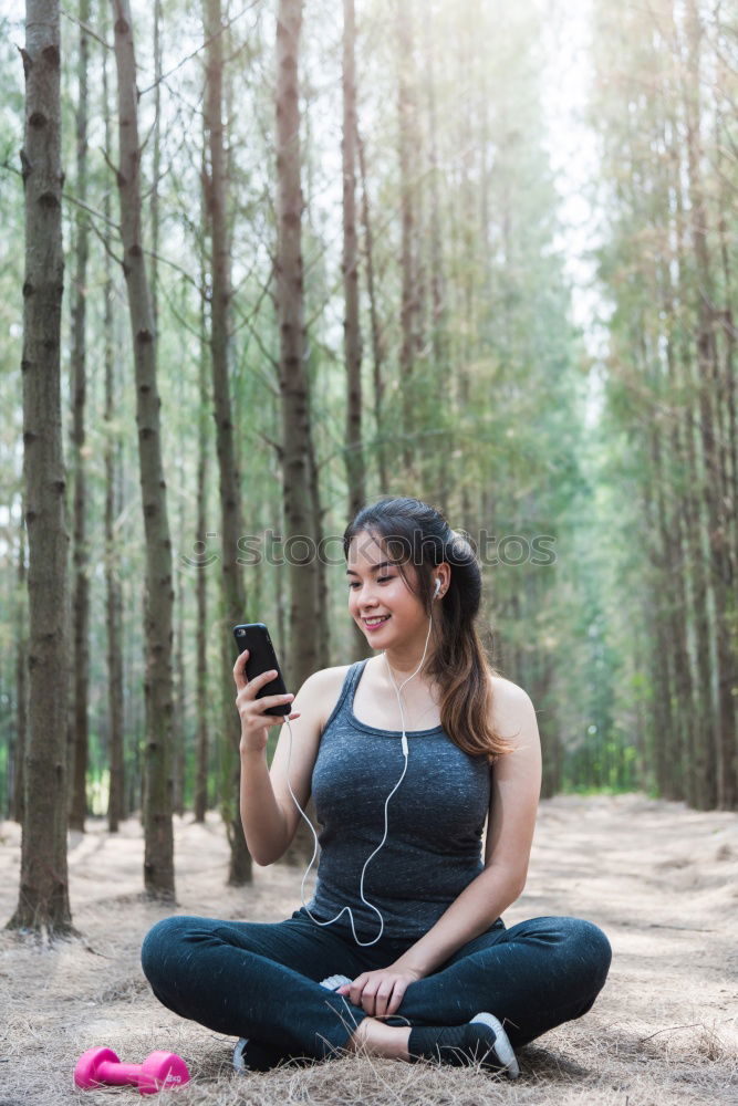 Similar – Image, Stock Photo African woman listening to music with earphones and smart phone