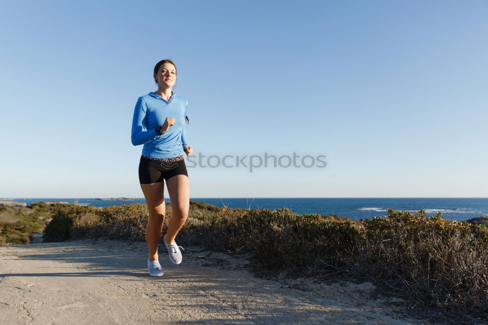 Similar – Runner on beach Walking