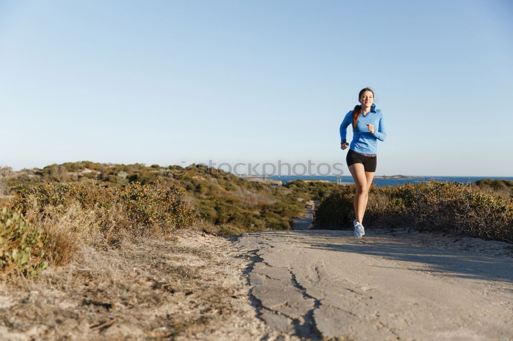 Similar – Runner on beach Walking