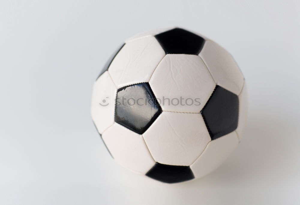 Similar – AM BALL BLEIBEN. Fußball