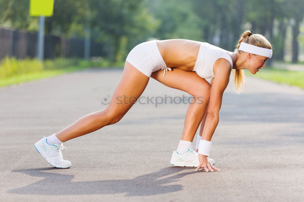 Similar – Young Woman working out outdoors and having fun