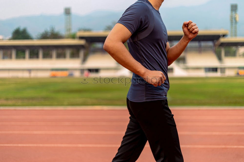 Young sports man is running up the stairs for his workout