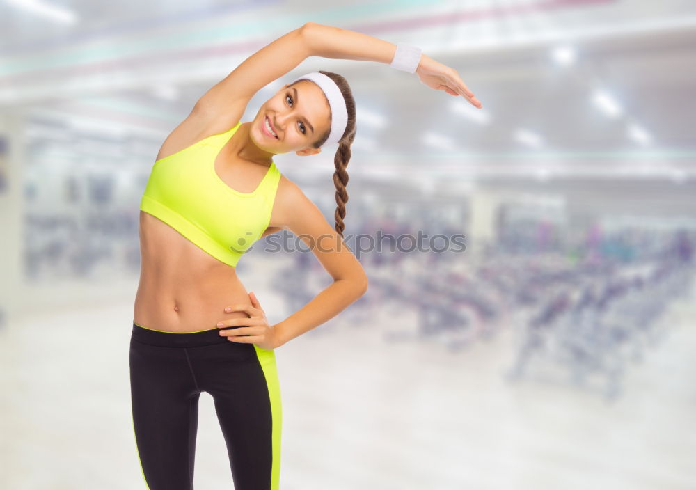 Similar – Young woman doing stretching exercises