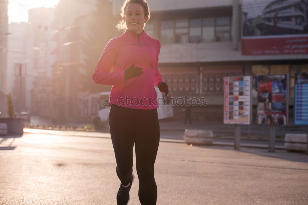 Similar – Image, Stock Photo Young couple running on a seafront promenade