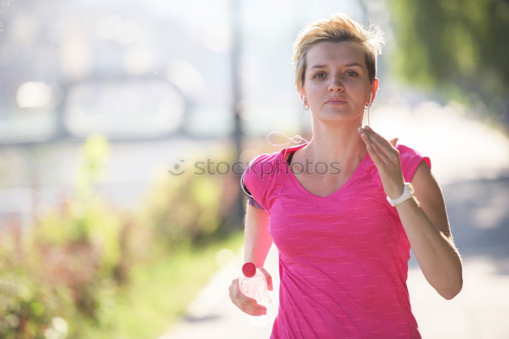 Similar – Athletic Woman in Running Exercise at the Park