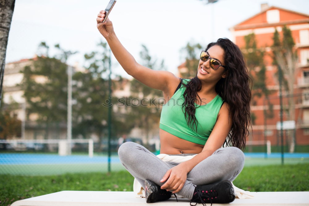 Similar – Image, Stock Photo African woman listening to music with earphones and smart phone