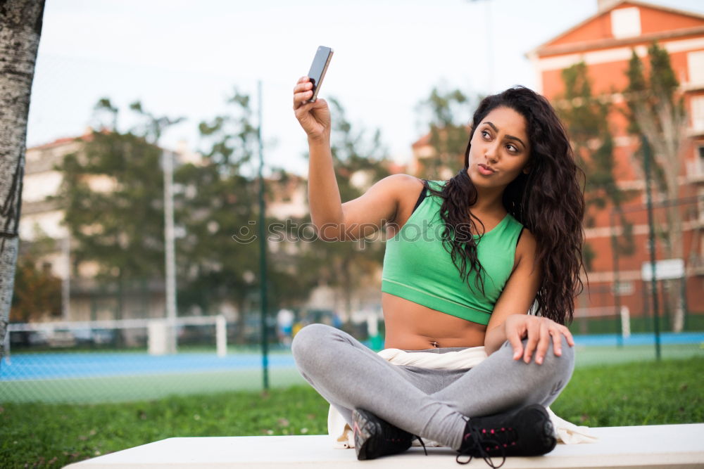 Similar – Image, Stock Photo African woman listening to music with earphones and smart phone