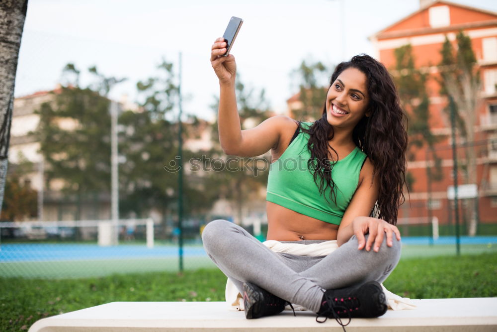 Similar – Image, Stock Photo African woman listening to music with earphones and smart phone