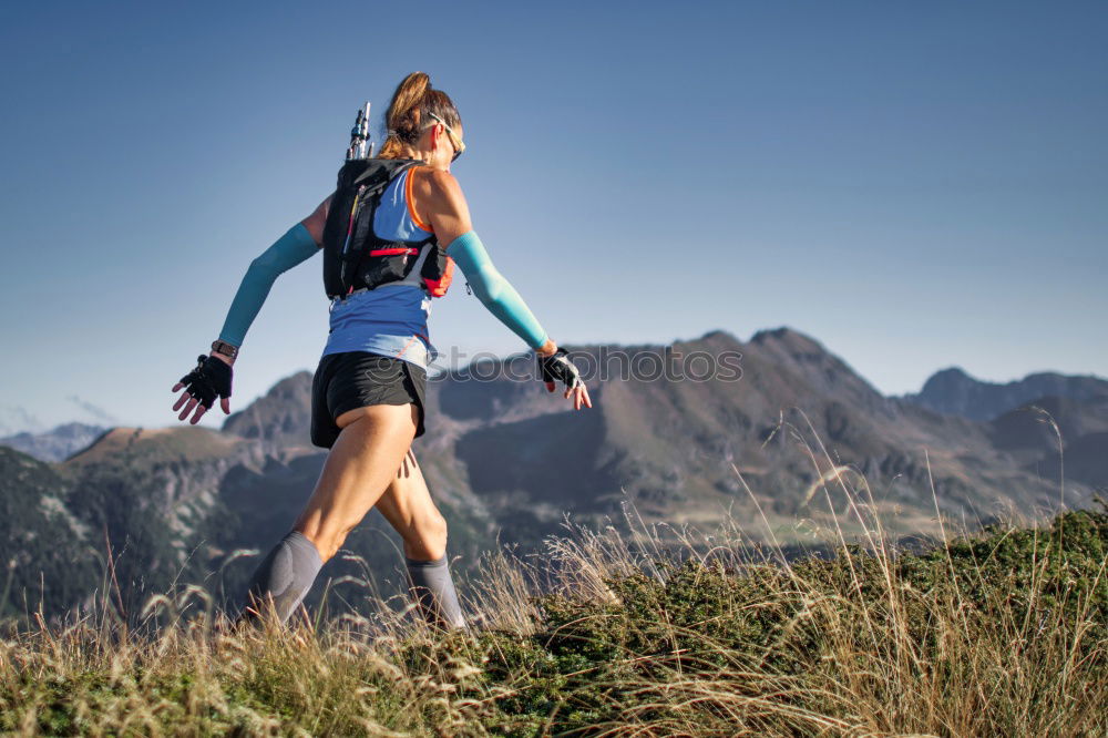 Similar – Woman jogging in countryside