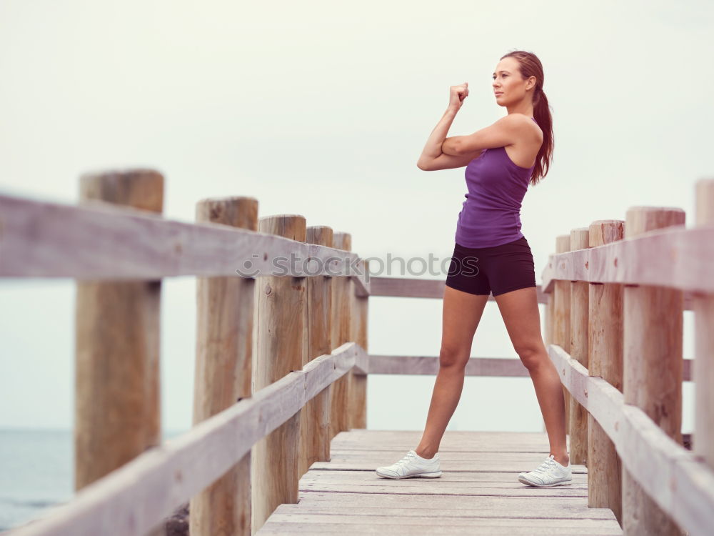 Similar – athletic woman eating an apple