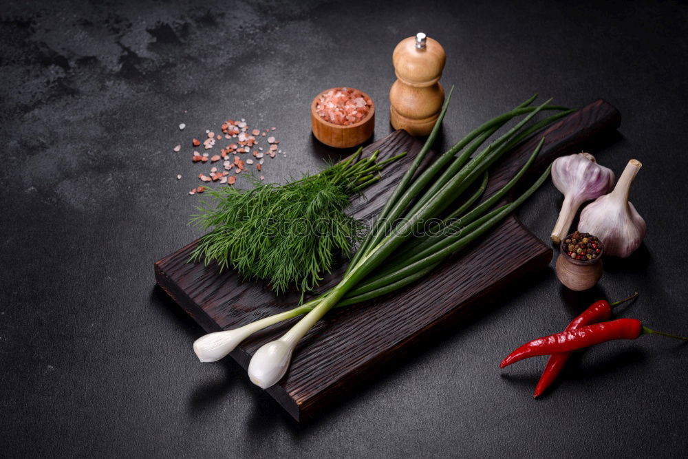 Similar – Image, Stock Photo Mushrooms and parsley on slate table.