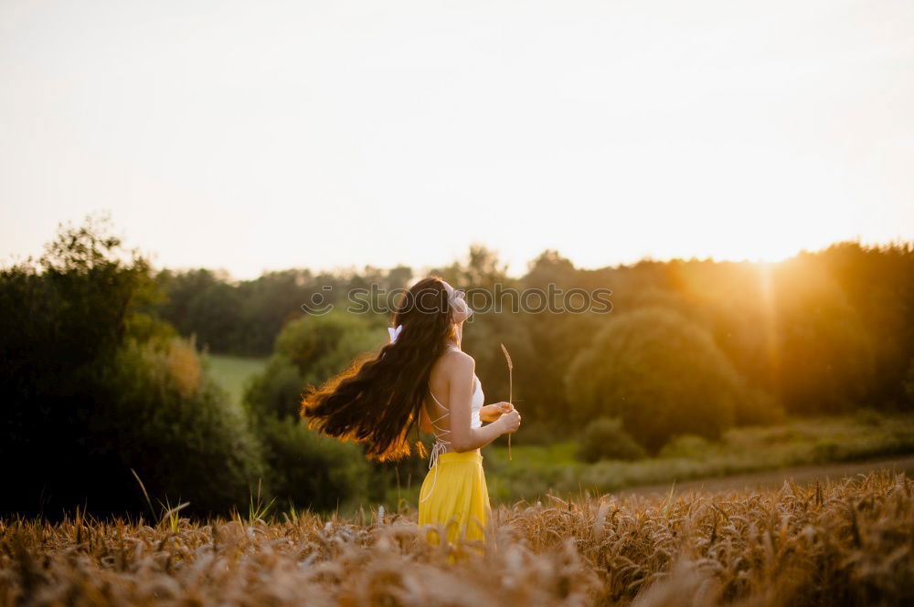 Similar – Image, Stock Photo Woman in green cold fields