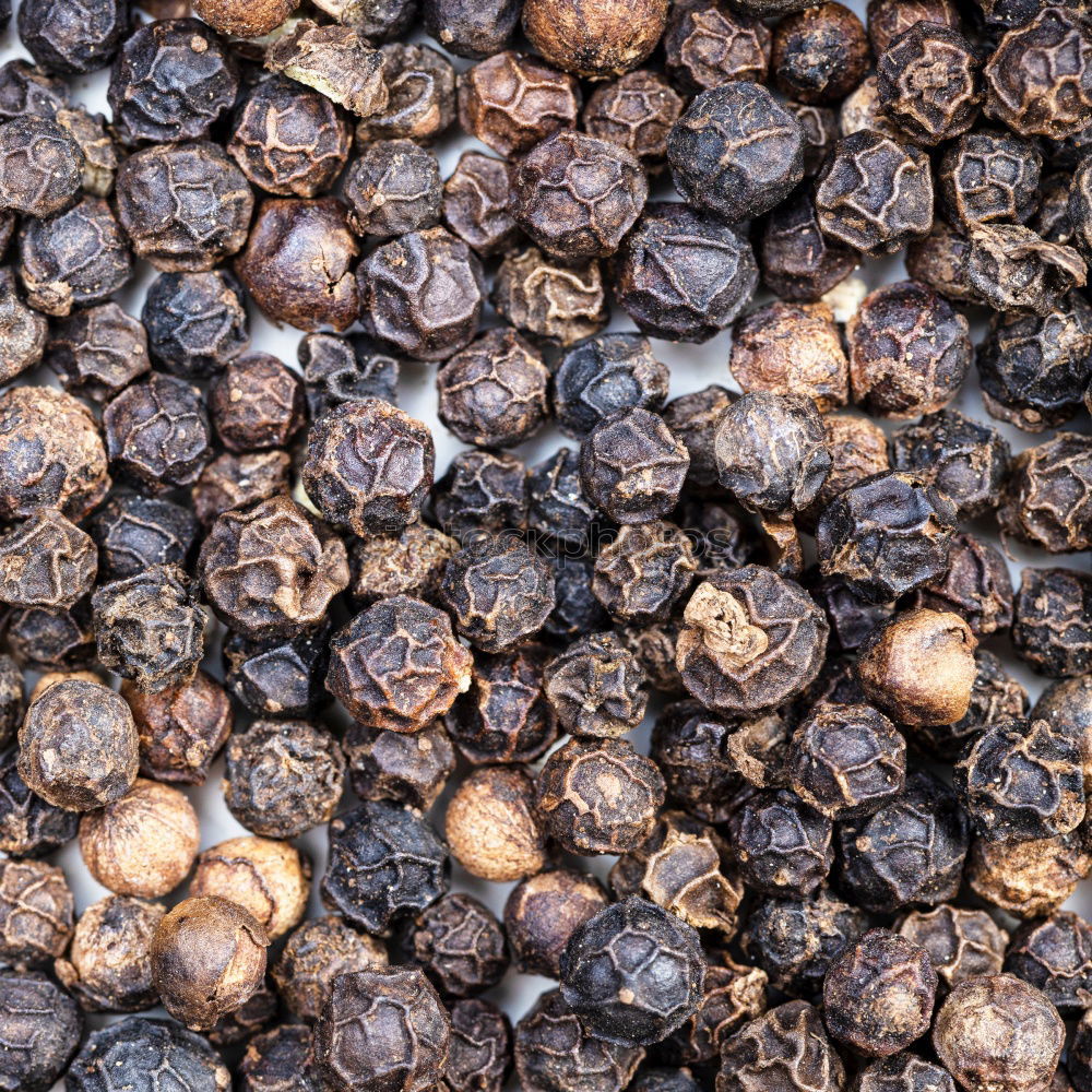 Similar – Image, Stock Photo Macro shot Black peppercorns on a wooden spoon